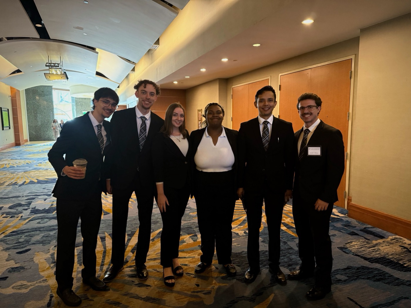 Professionals in modern hallway