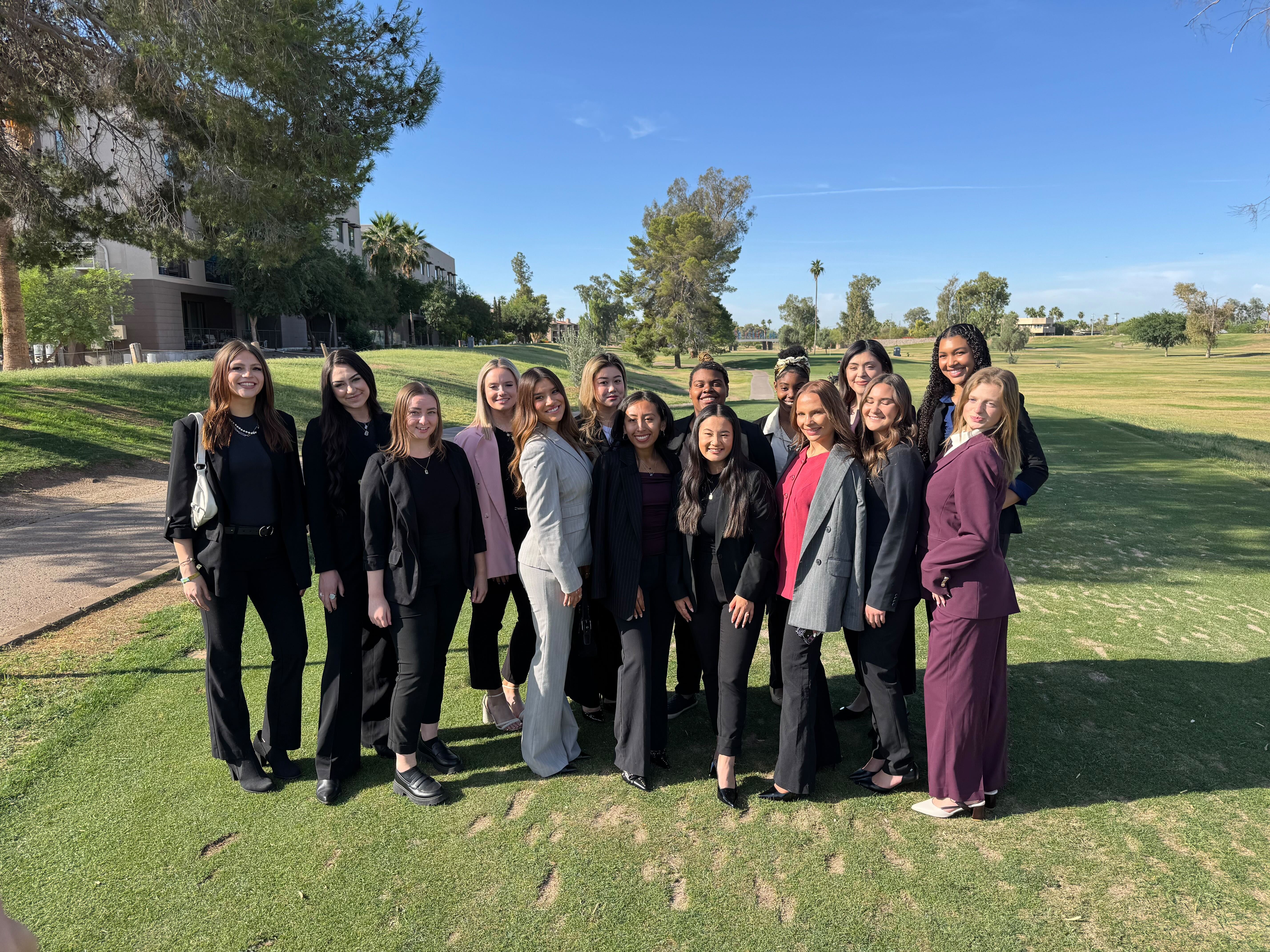 Large Reformed Marketing team group photo outdoors